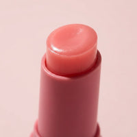 Close-up van de roze balm-tip van de stick